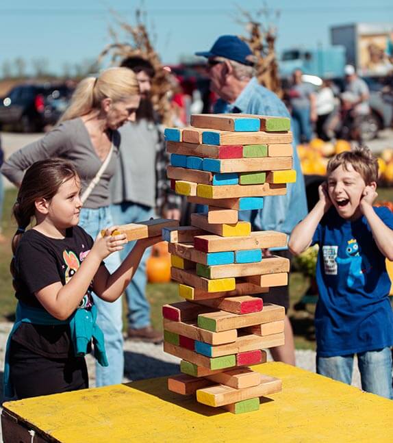 Children playing games at the Pumpkin Palooza.